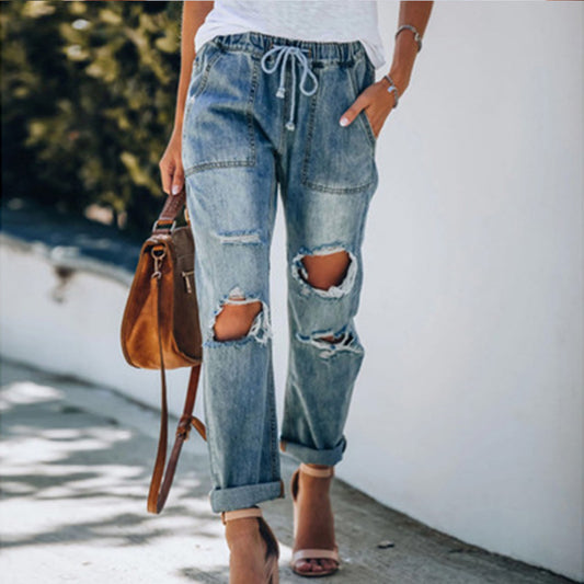 Ripped lace-up white trouser jeans