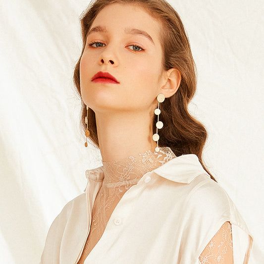 Exaggerated metal disc earrings women long