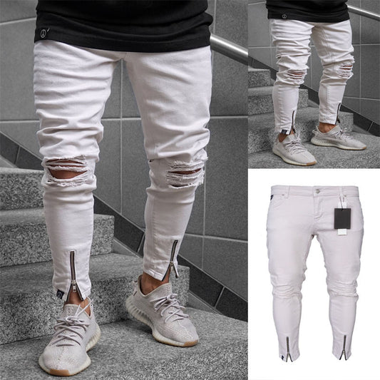 Shredded white jeans
