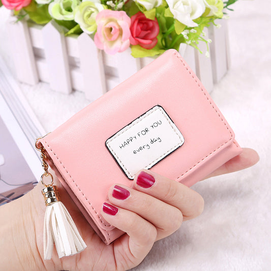 The new Korean letter short Purse Wallet 70 percent off tassel button female wallet capacity