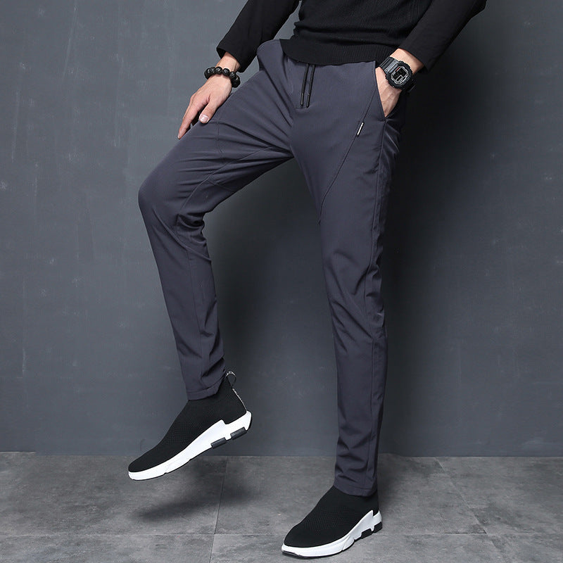 2021 winter new style young people fashion pants pants sports pants Korean version of men body pants tide