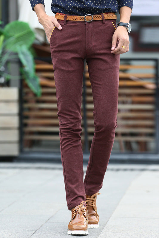 A winter men's casual pants cashmere trousers with thickened young Korean all-match slim feet long pants men wholesale